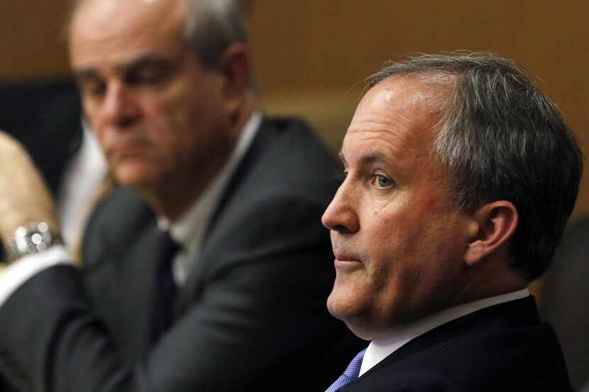 
Texas Attorney General Ken Paxton, shown during a pretrial motion hearing in McKinney,...