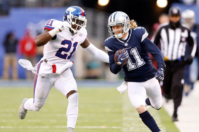 Dallas Cowboys wide receiver Cole Beasley (11) is chased by New York Giants strong safety...