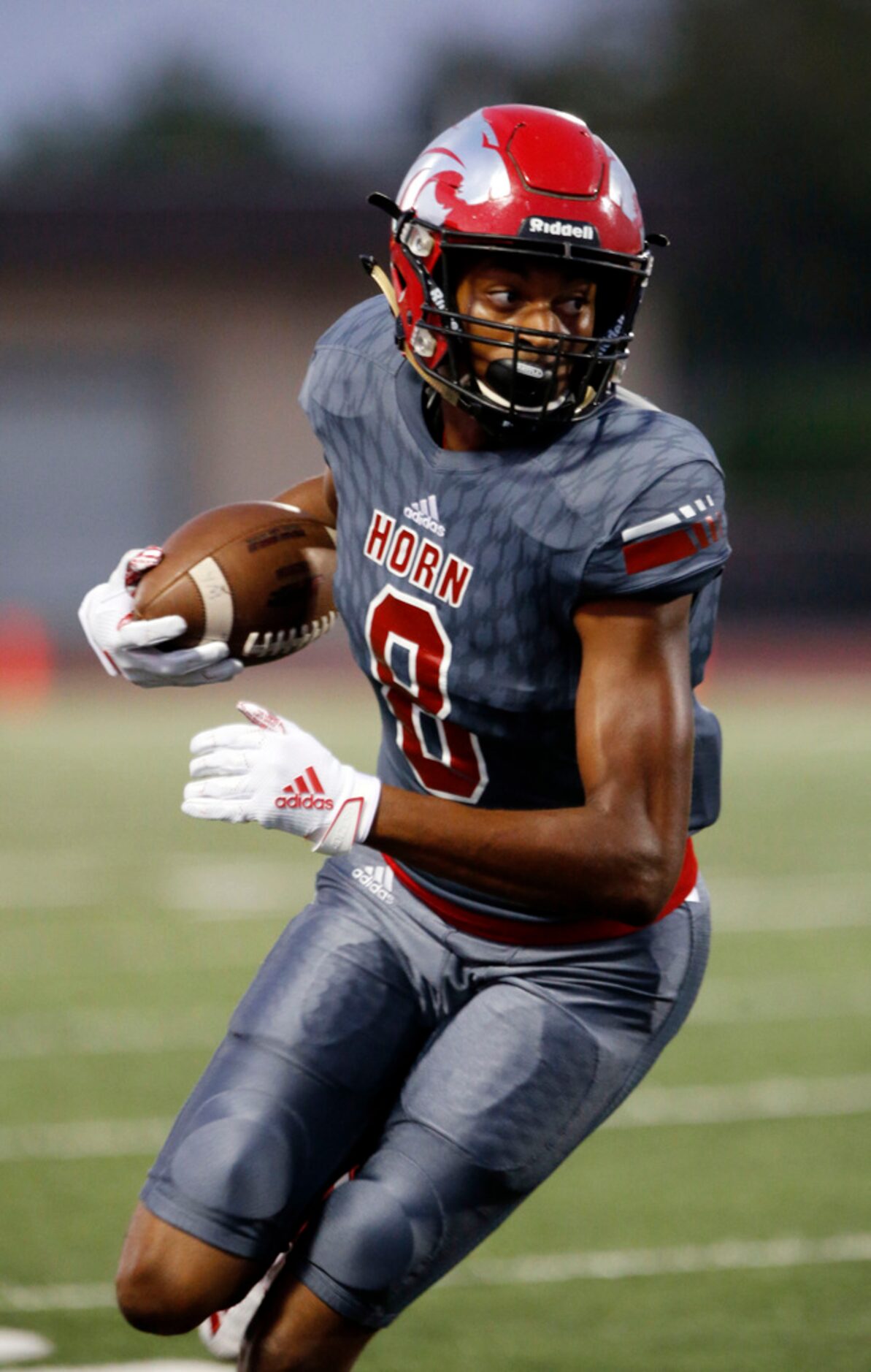 John Horn WR Donovan Payne (8) advances a reception during the first half of their high...