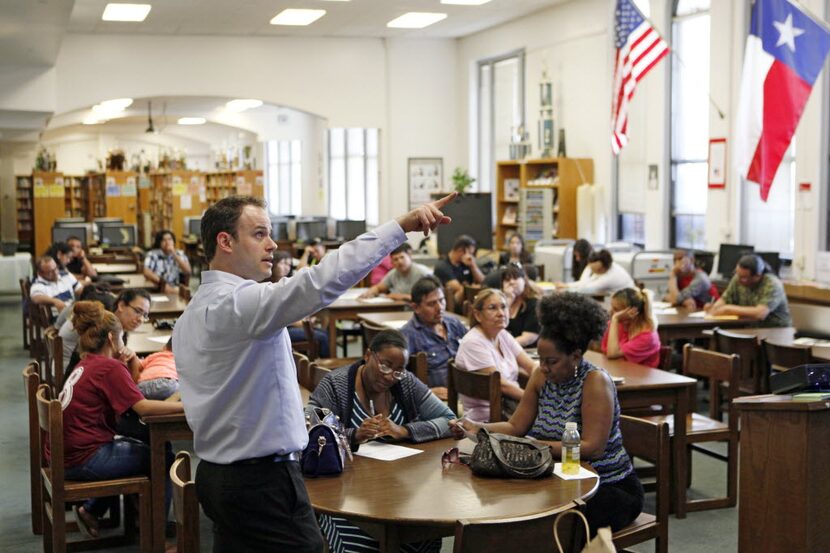 Immigration attorney Daniel Stewart conducts a workshop for immigrants on Deferred Action...