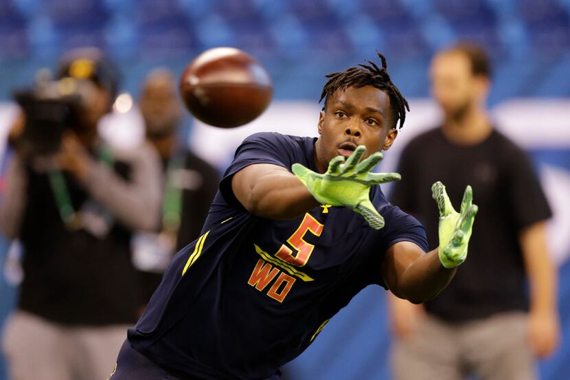 Ohio State wide receiver Noah Brown runs a drill at the NFL football scouting combine in...