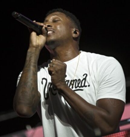  Musician Lacrae performs during the Harvest America event. (G.J. McCarthy/The Dallas...