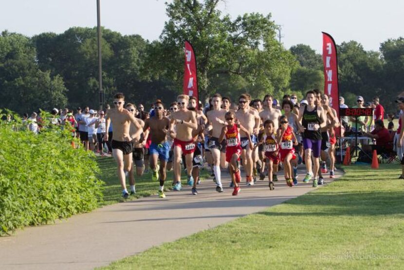 
Runners participate in the Epic Charity Challenge Run in support of The Turning Point,...