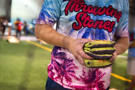 Will Davis holds his bags before stating a match in a cornhole tournament hosted by North...