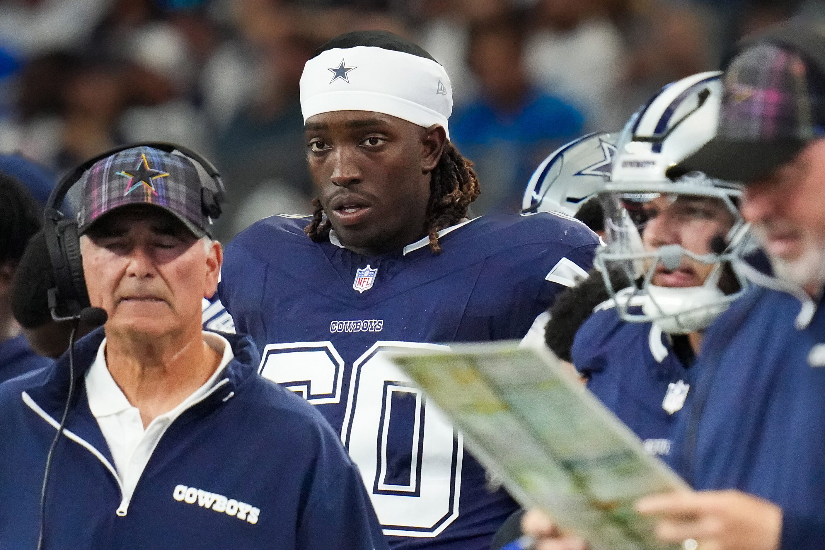 Dallas Cowboys offensive tackle Tyler Guyton (60) watches from the bench during the first...