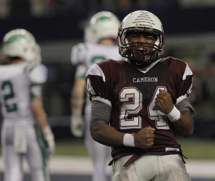 Cameron Yoe's Traion Smith celebrates after scoring a touchdown against Wall during the...