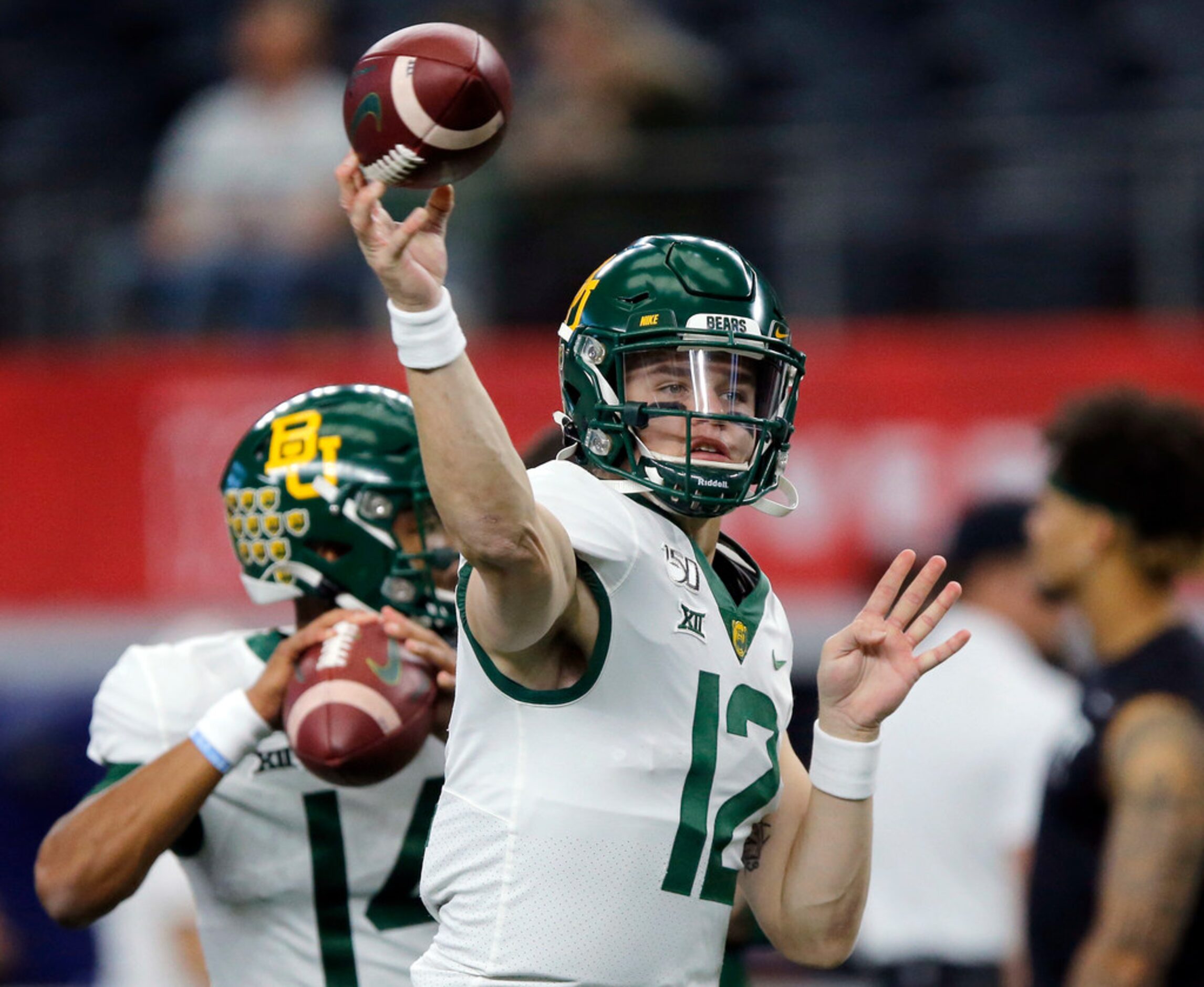 Baylor Bears quarterback Charlie Brewer (12)   warms up his arm before facing the Baylor...