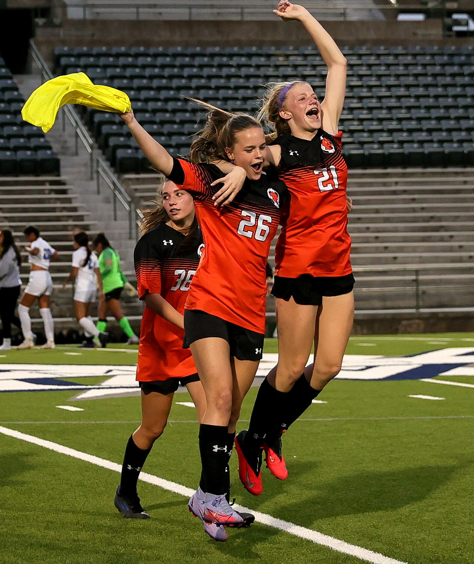 Rockwall's Morgan Countryman (26) and Avery Shipman (21) celebrate their victory over...