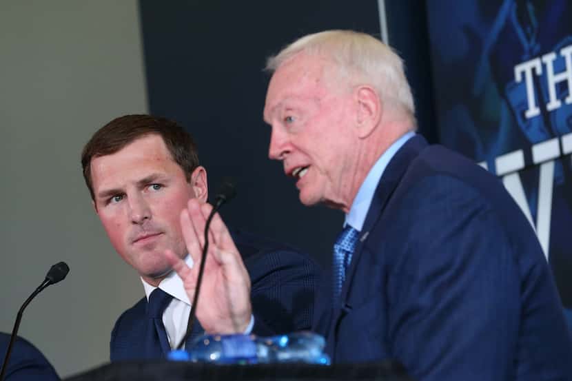 Dallas Cowboys tight end Jason Witten looks over to Dallas Cowboys owner Jerry Jones as he...