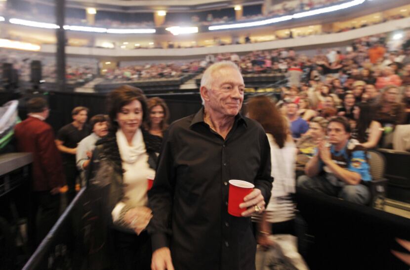 Jerry and Gene Jones find their seats before the start of a Bon Jovi concert at American...