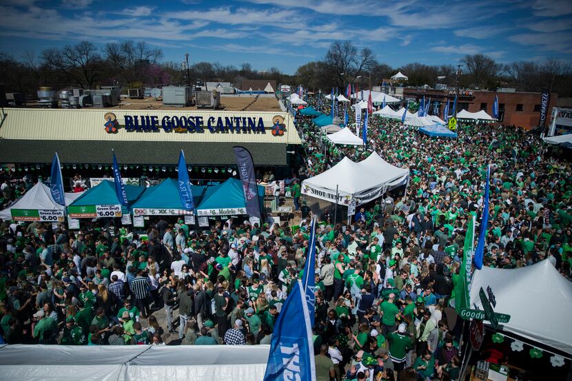 People attending the Lower Greenville Avenue St. Patrick's Block Party in Dallas on...