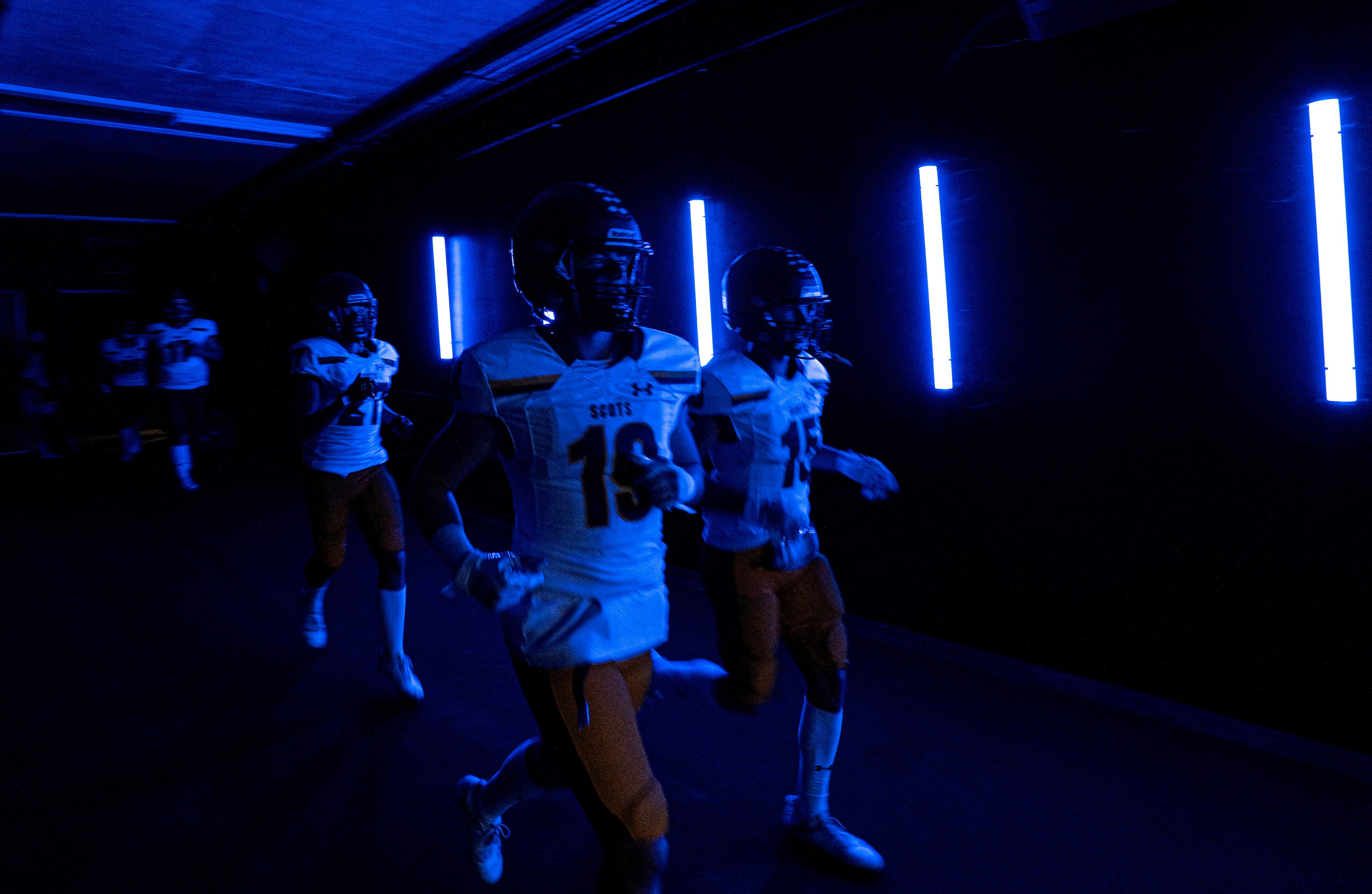 Highland Park junior linebacker Paxton Smith (19) and junior wide receiver Bryce Laczkowski...