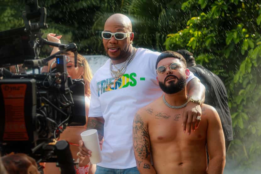 NATEGAWD poses with Flo Rida, who appeared in the music video for "Take a Shot and Make a...