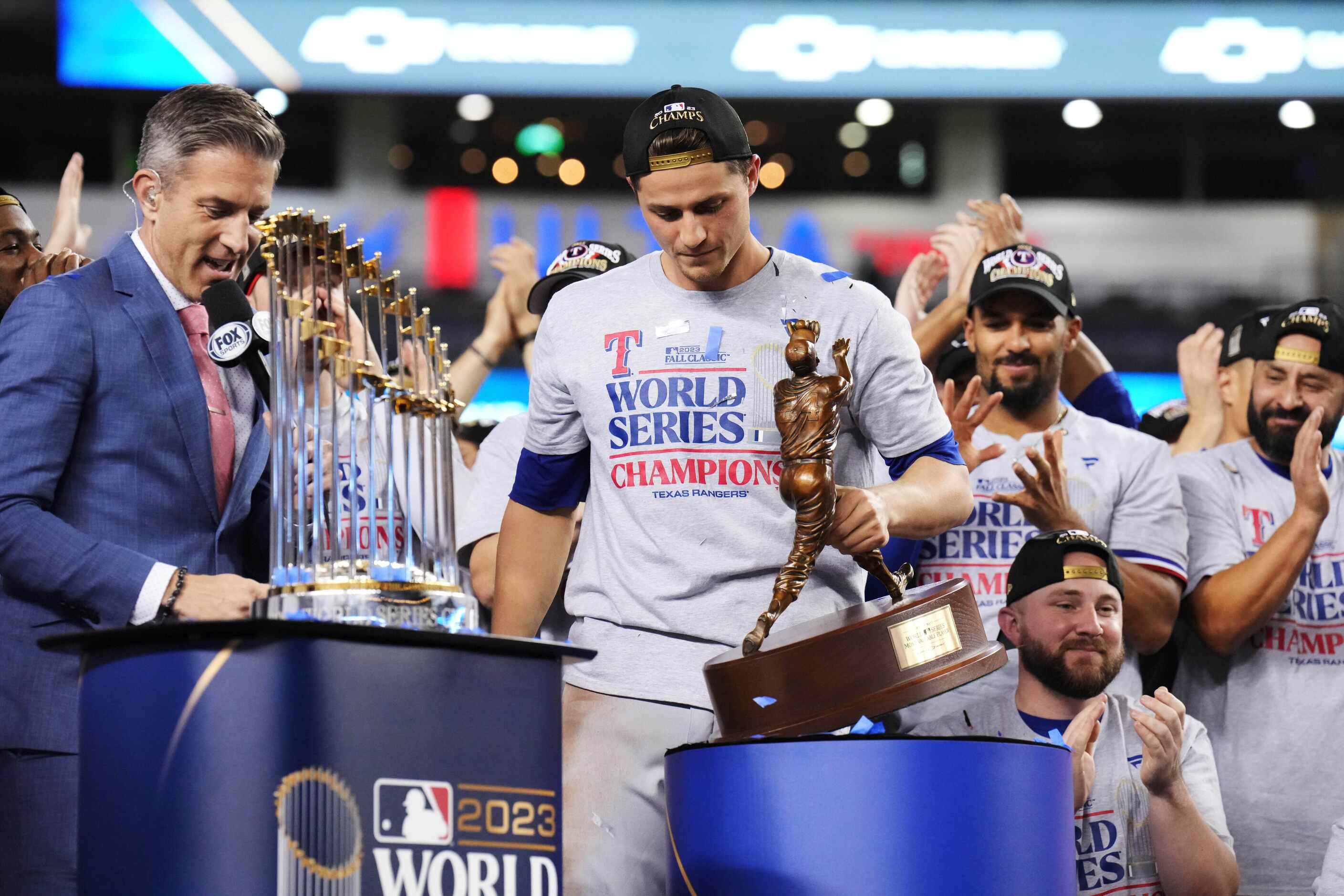 Texas Rangers shortstop Corey Seager celebrates winning MVP
of the World Series after...