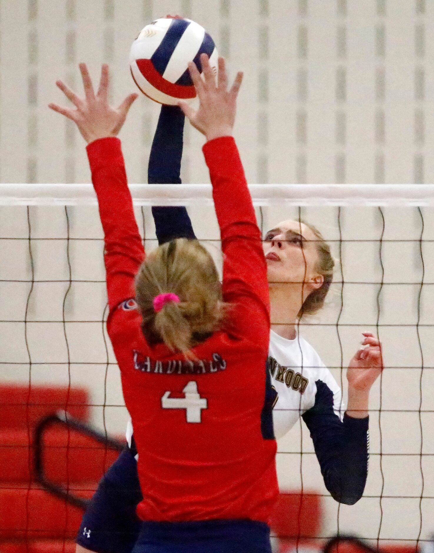 Prestonwood Christian Academy outside hitter Jadyn Livings (4) gets a hit as John Paul II...