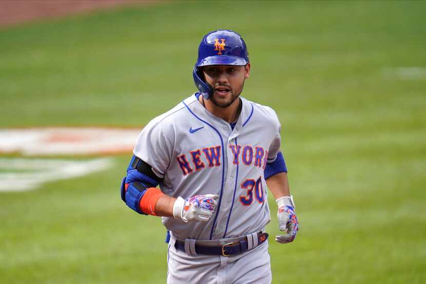 New York Mets' Michael Conforto runs the bases after hitting a home run against Baltimore...