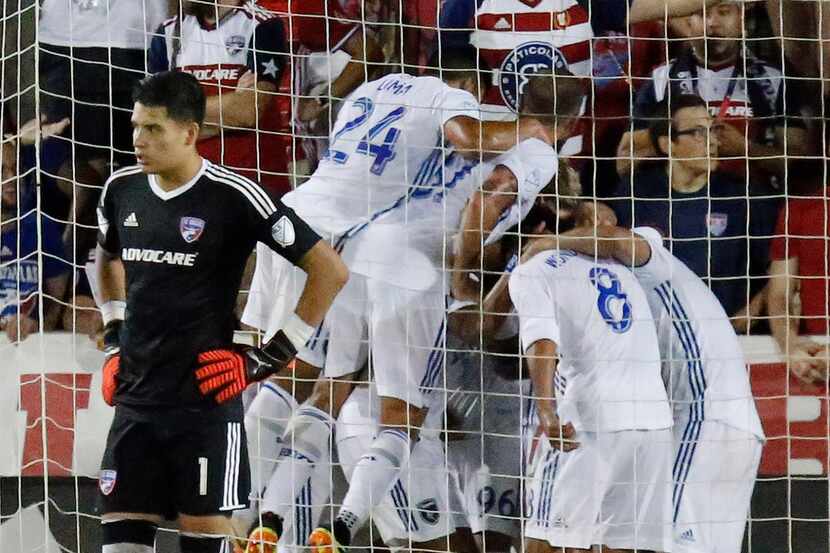 FC Dallas goalkeeper Jesse Gonzalez (1) had a rough time as San Jose Earthquakes celebrated...