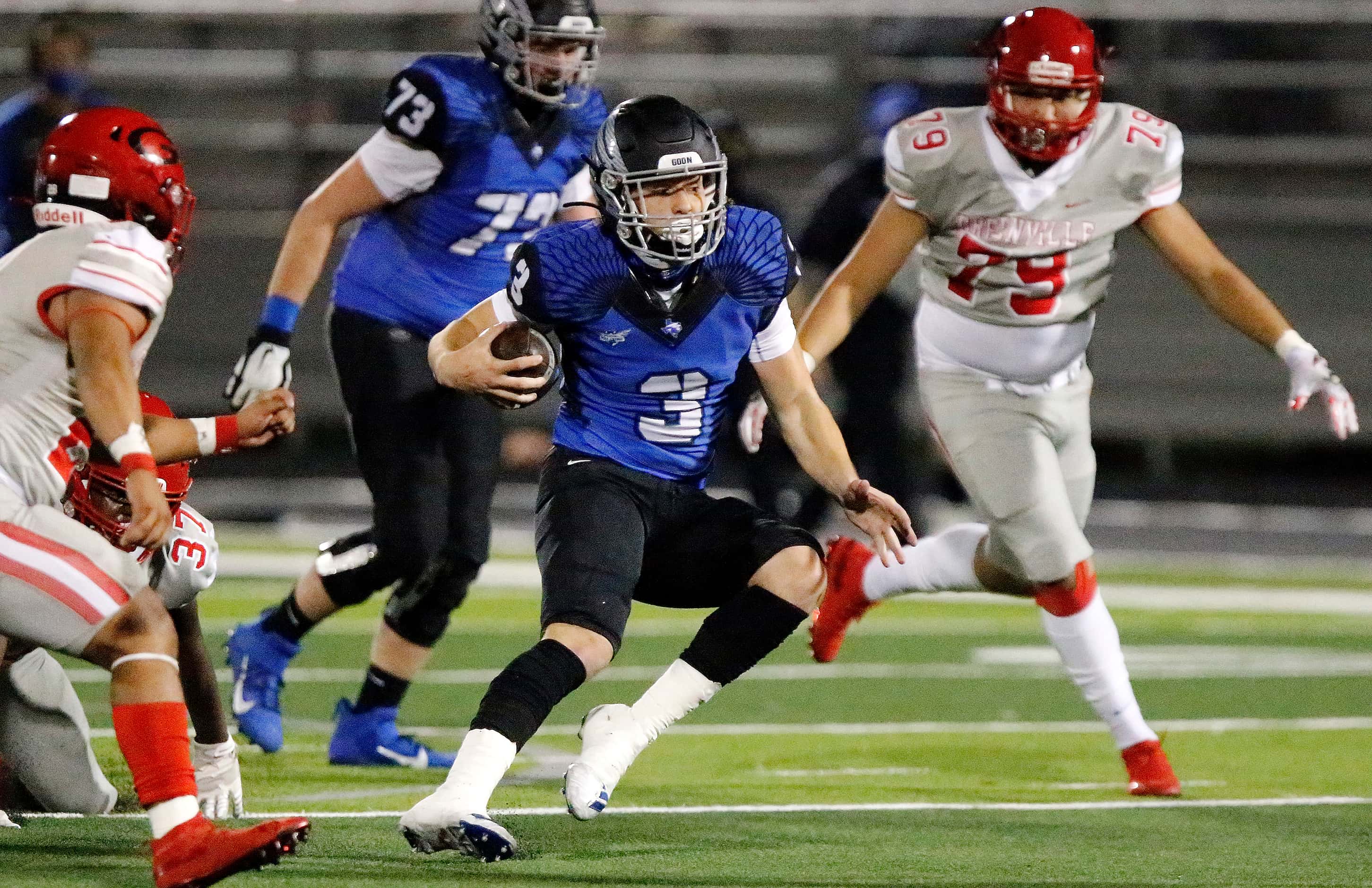 North Forney High School quarterback Jacob Acuna (3) runs the football during the first half...