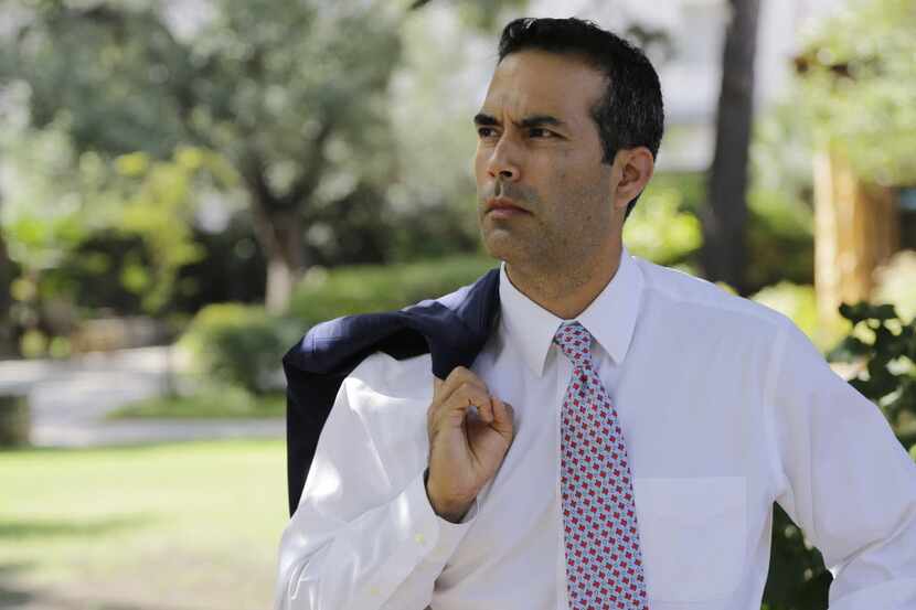 Texas Land Commissioner George P. Bush tours the grounds of the Alamo following a news...