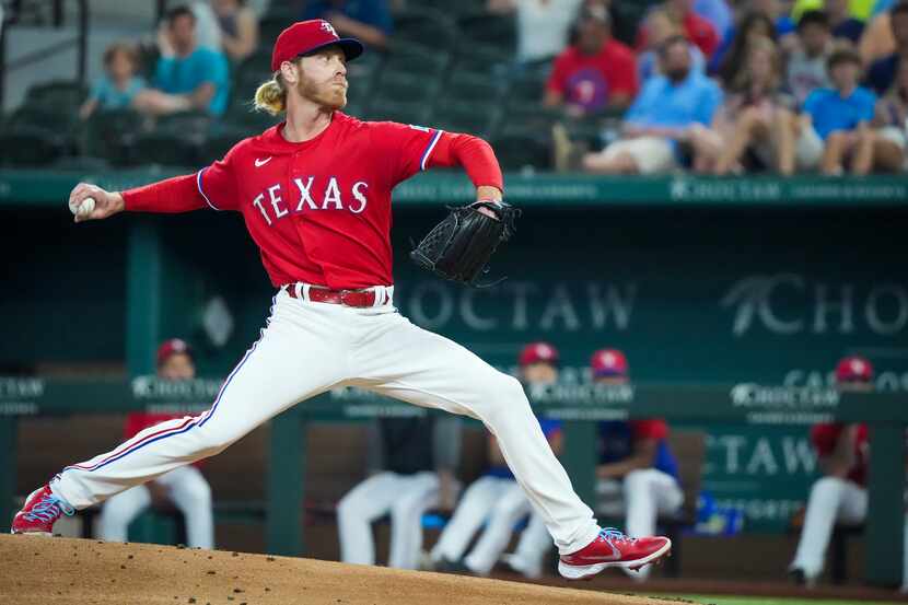 Texas Rangers starting pitcher Mike Foltynewicz delivers during the first inning against the...