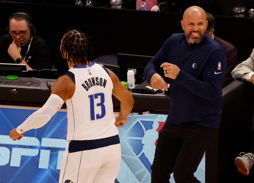 Dallas Mavericks head coach Jason Kidd and Dallas Mavericks guard Jalen Brunson (13)...