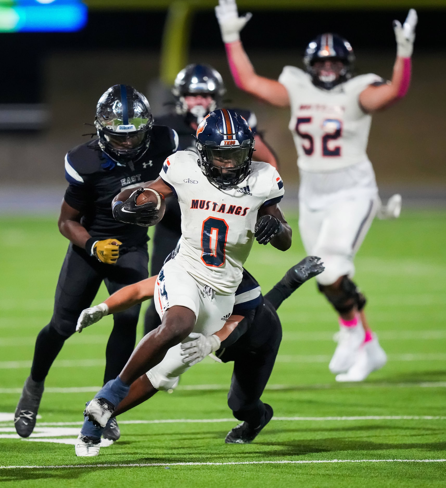 Sachse running back Brendon Haygood (0) breaks through the Wylie East defense during the...