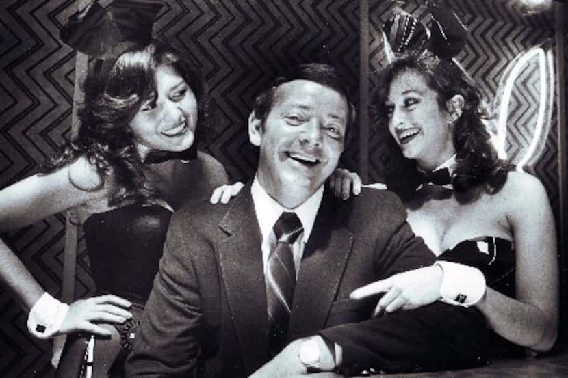  Carroll Davis, Dallas Playboy Club owner poses with playmates Debbie Gonzales, (left), and...