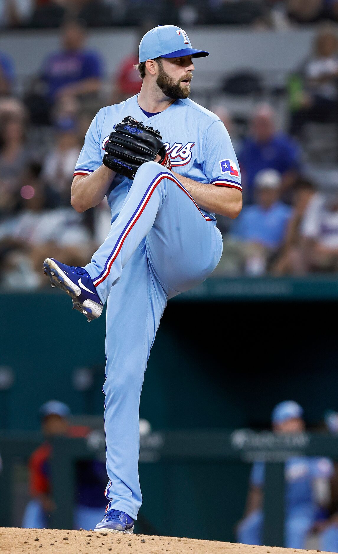 Texas Rangers starting pitcher Jordan Lyles (24) throws against the Kansas City Royals in...