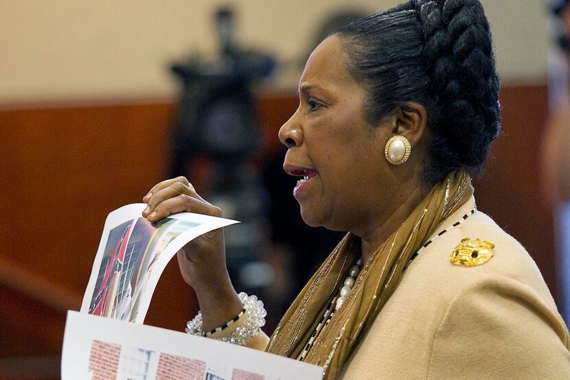 U.S. Rep. Sheila Jackson Lee, D-Houston, held up photographs while discussing a proposed...