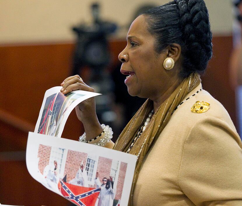 U.S. Rep. Sheila Jackson Lee, D-Houston, held up photographs while discussing a proposed...