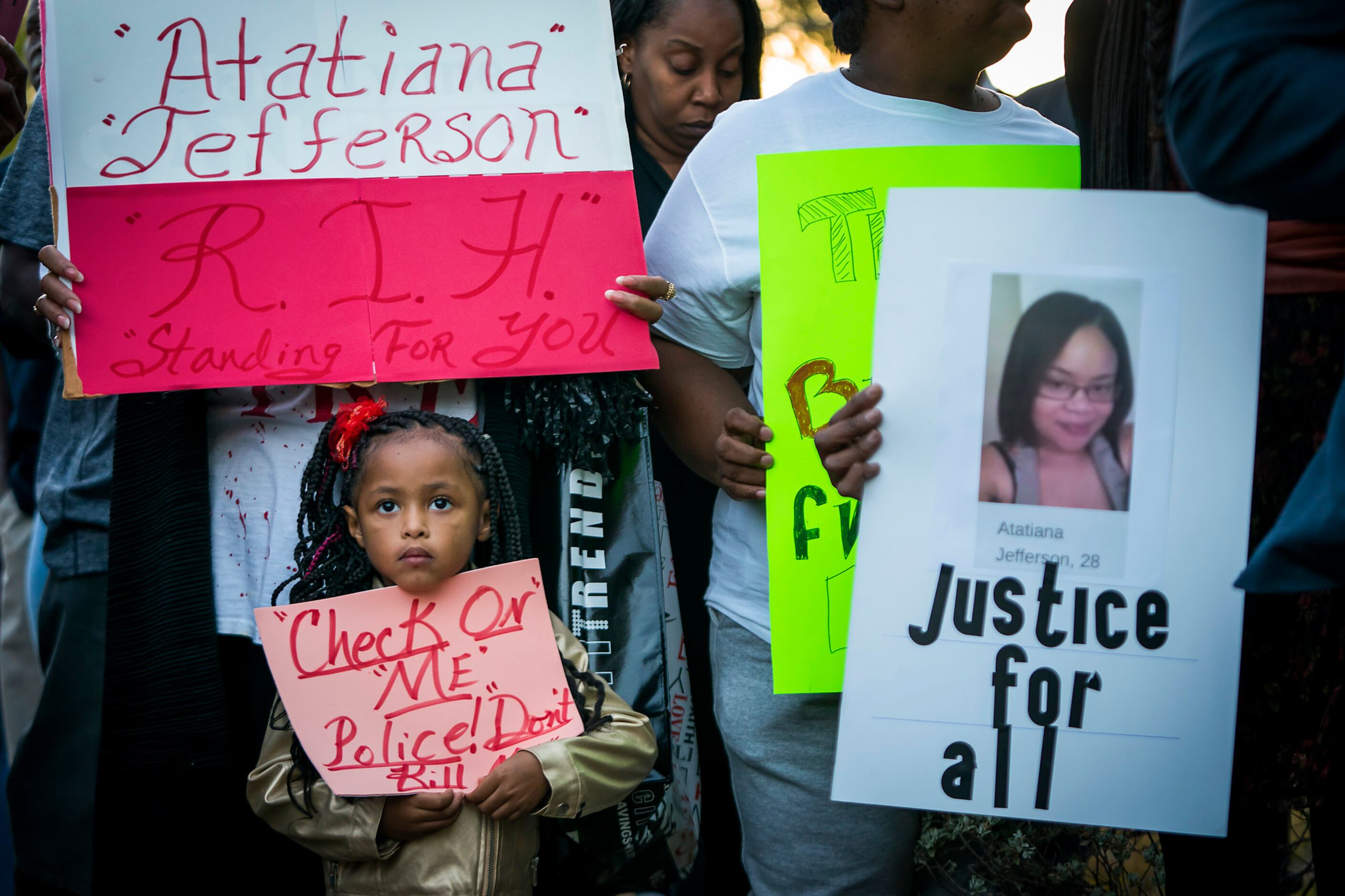 Trinity Ford, 4, was among the crowd gathered during a community vigil for Atatiana...