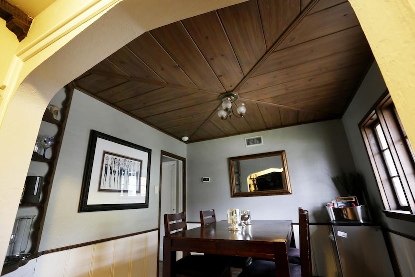  Jana and Scott Boyles’  home has a paneled ceiling in the dining room, a ceiling beam in...