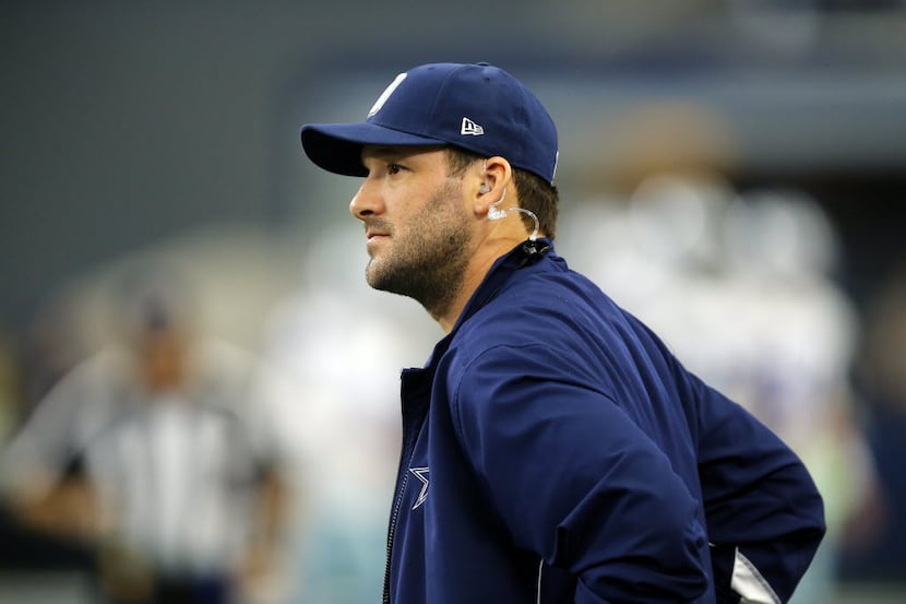 Dallas Cowboys quarterback Tony Romo paces the sidelines during the Washington Redskins game...