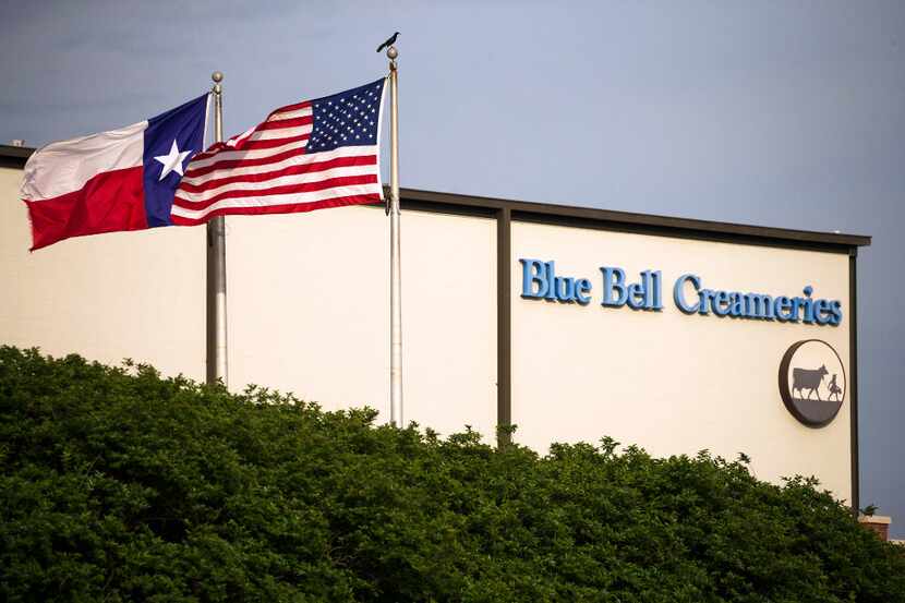 In thus April 23, 2015 file photo, flags flutter in the breeze outside of the Blue Bell...