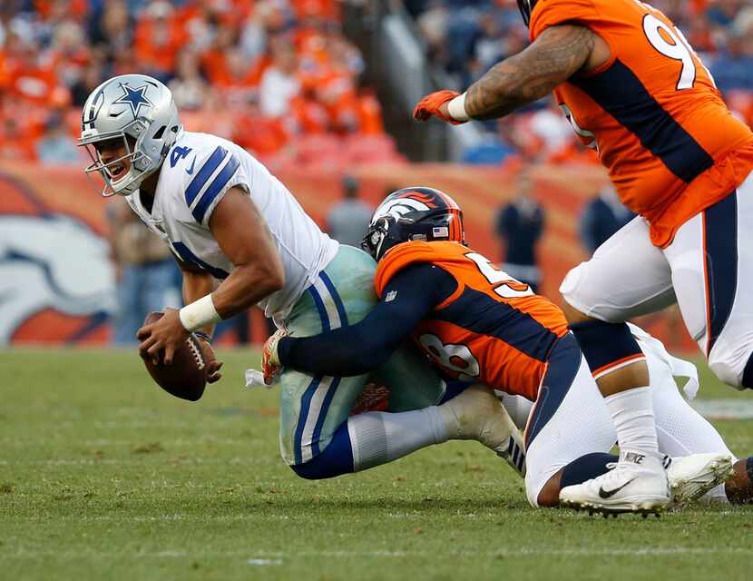 Denver Broncos linebacker Von Miller sacks Dallas Cowboys quarterback Dak Prescott during a...