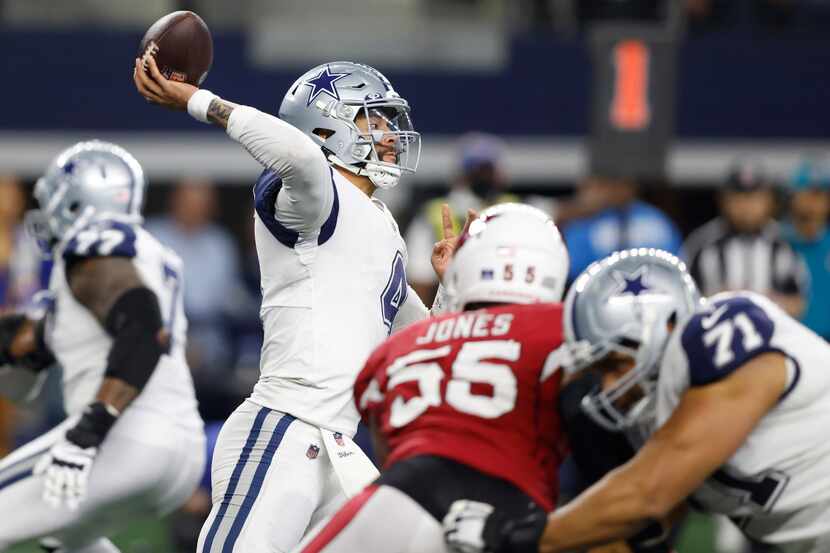 Dallas Cowboys quarterback Dak Prescott (4) attempts a pass in a game against the Arizona...