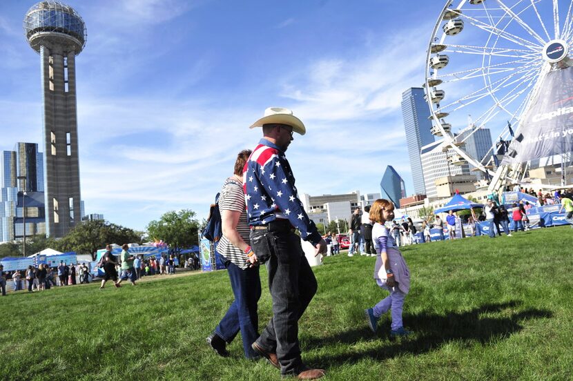 From left Christie Rucker, Keith Rucker and their daughter Kayla Rucker, 6, walk through the...