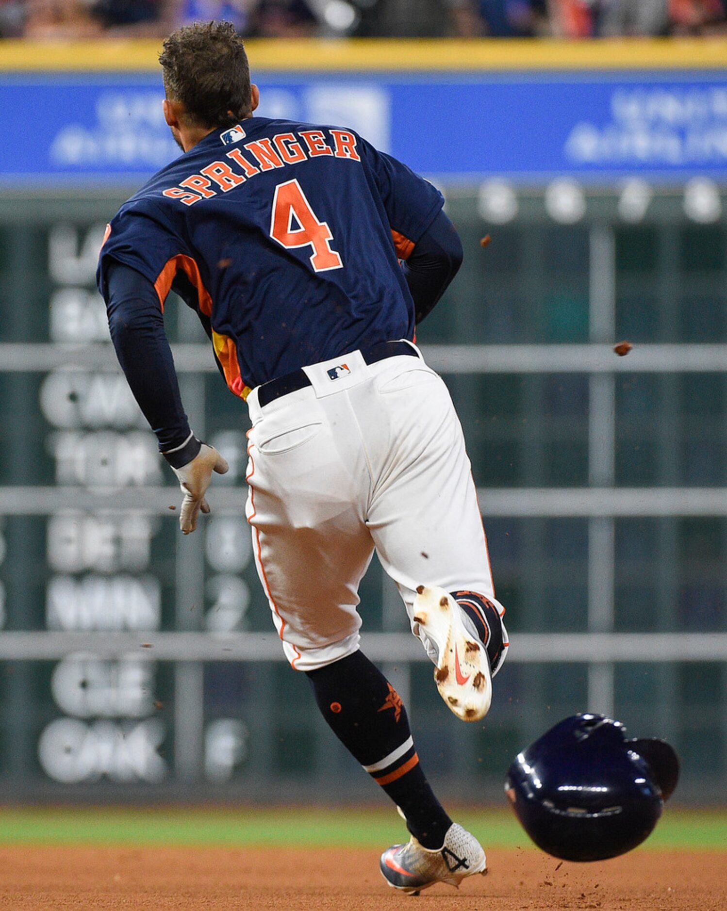 Houston Astros' George Springer runs to second after hitting a double during the third...