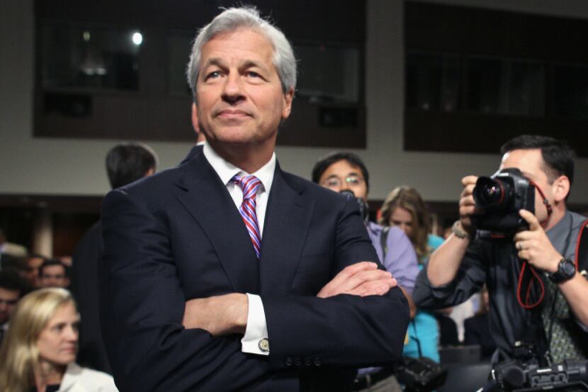 JPMorgan Chase chief Jamie Dimon was awarded a 74 percent pay hike in 2013 despite the fact...