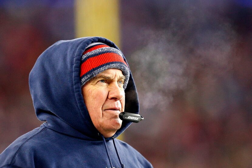 FOXBORO, MA - JANUARY 10: Head coach Bill Belichick of the New England Patriots looks on...