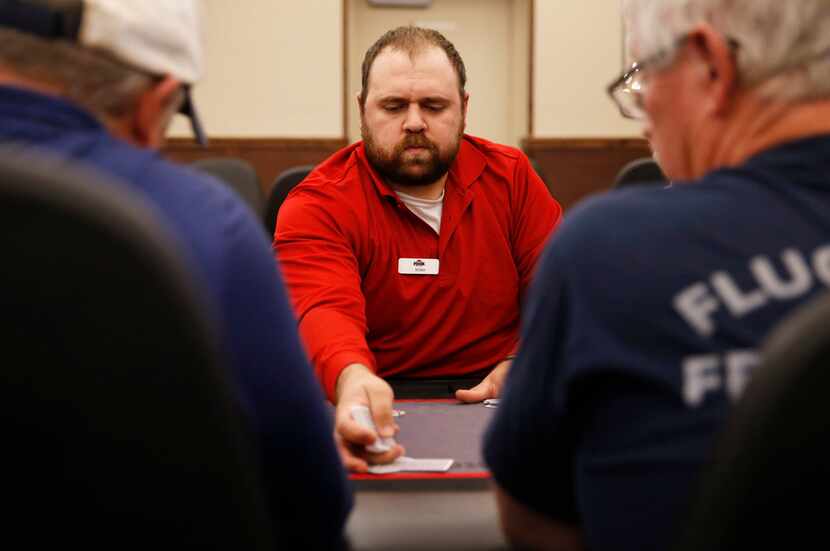 FTN Poker employee Bobby Wickham deals a hand at the private club in McKinney. 