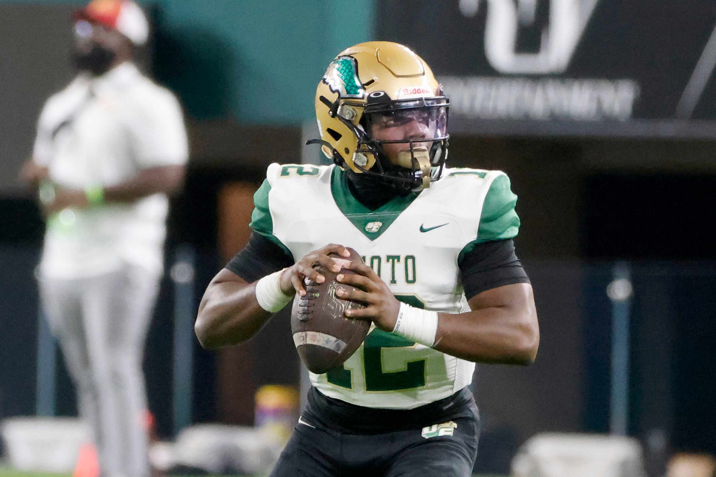 DeSoto quarterback Matthew Allen (12) looks to throw against Rockwall during the second half...