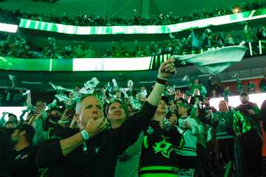 Dallas Stars fans cheer ahead of Game 2 of an NHL hockey Stanley Cup second-round playoff...