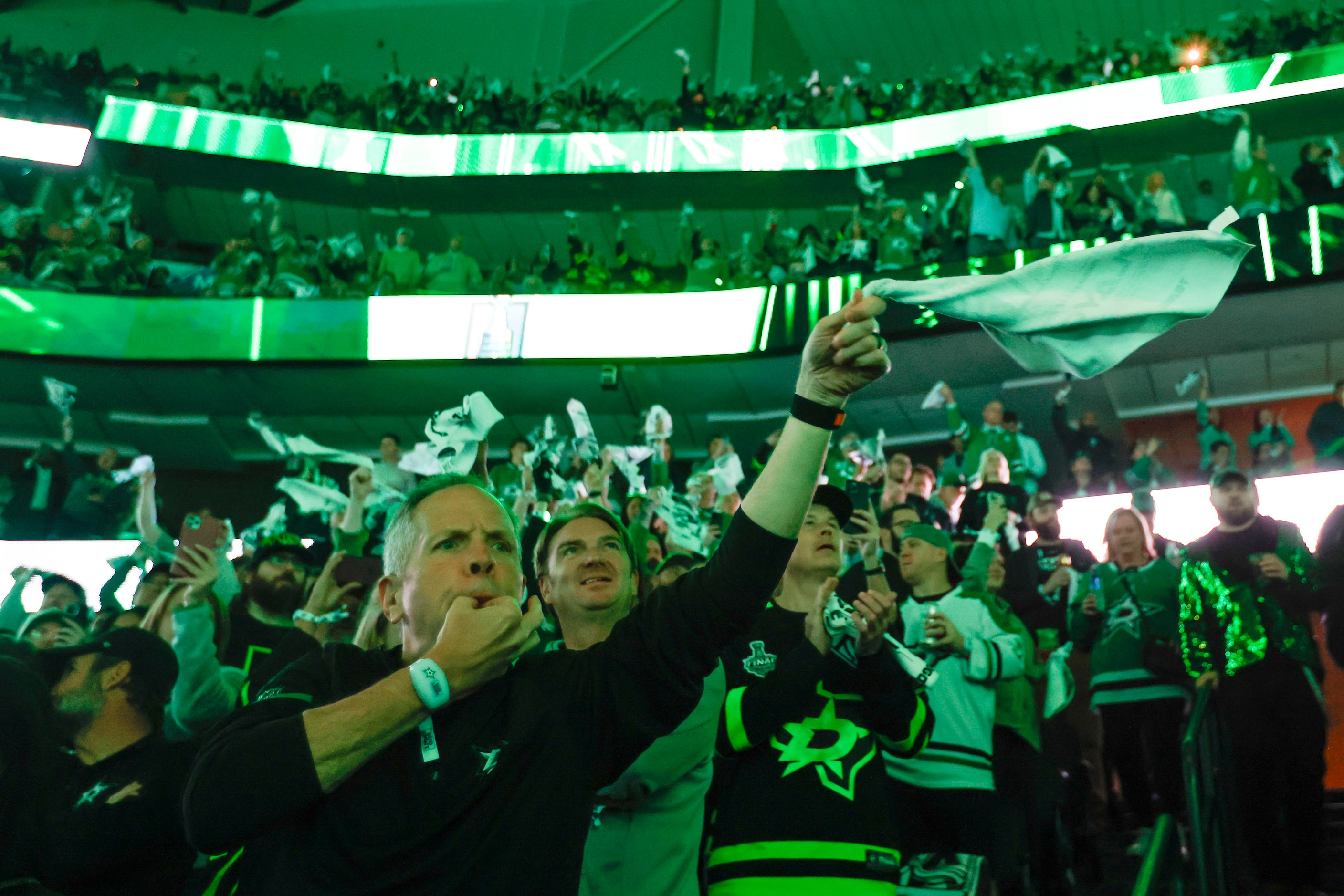 Dallas Stars fans cheer ahead of Game 2 of an NHL hockey Stanley Cup second-round playoff...