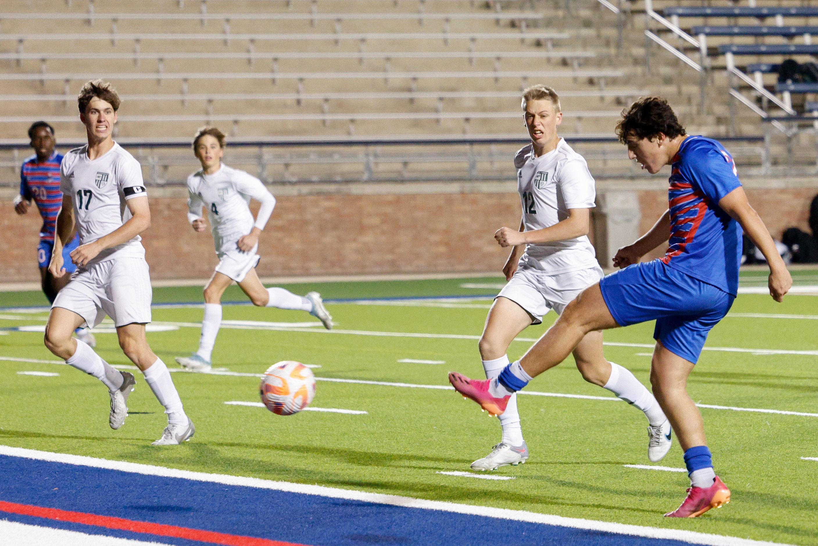 Allen’s Evan Ruiz (28) scores a goal past Prosper’s Tate Jones (17) and Joshua Lynn (12)...