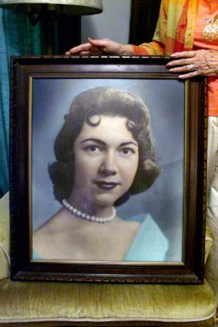 Herlinda de la Vina displayed a picture of her niece, Irene Garza, in this 2003 photo....