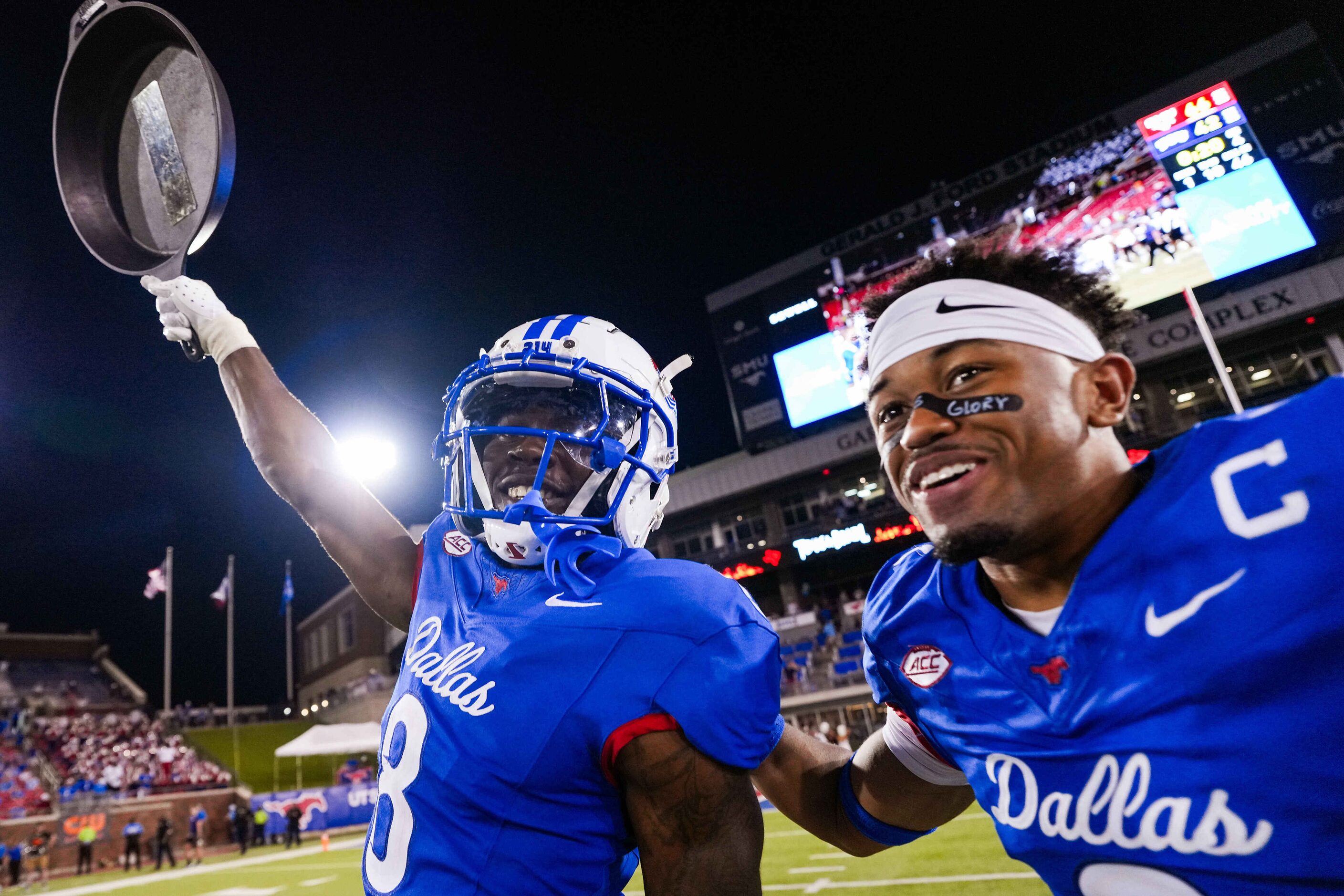 SMU wide receiver Jordan Hudson (8) and safety Jonathan McGill (2) celebrate with the Iron...