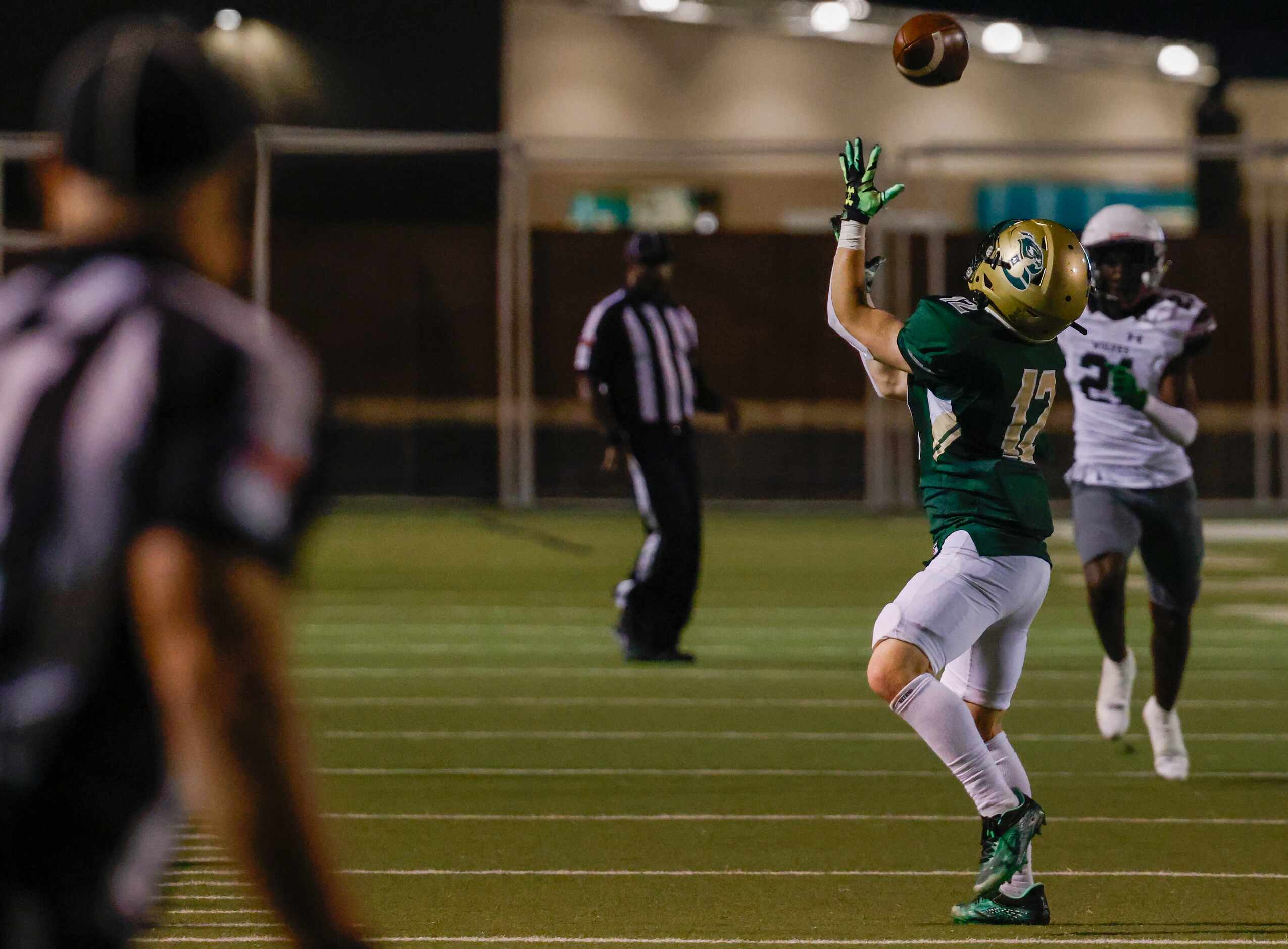 Birdville wide receiver Caleb Kelly (12) moves to catch the ball in the first half of a game...