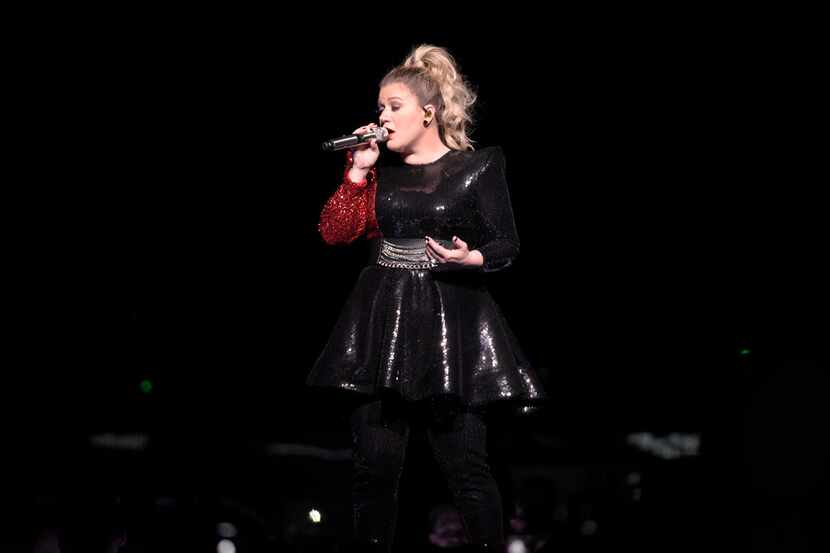 LOS ANGELES, CALIFORNIA - JANUARY 26: Singer Kelly Clarkson performs at Staples Center on...