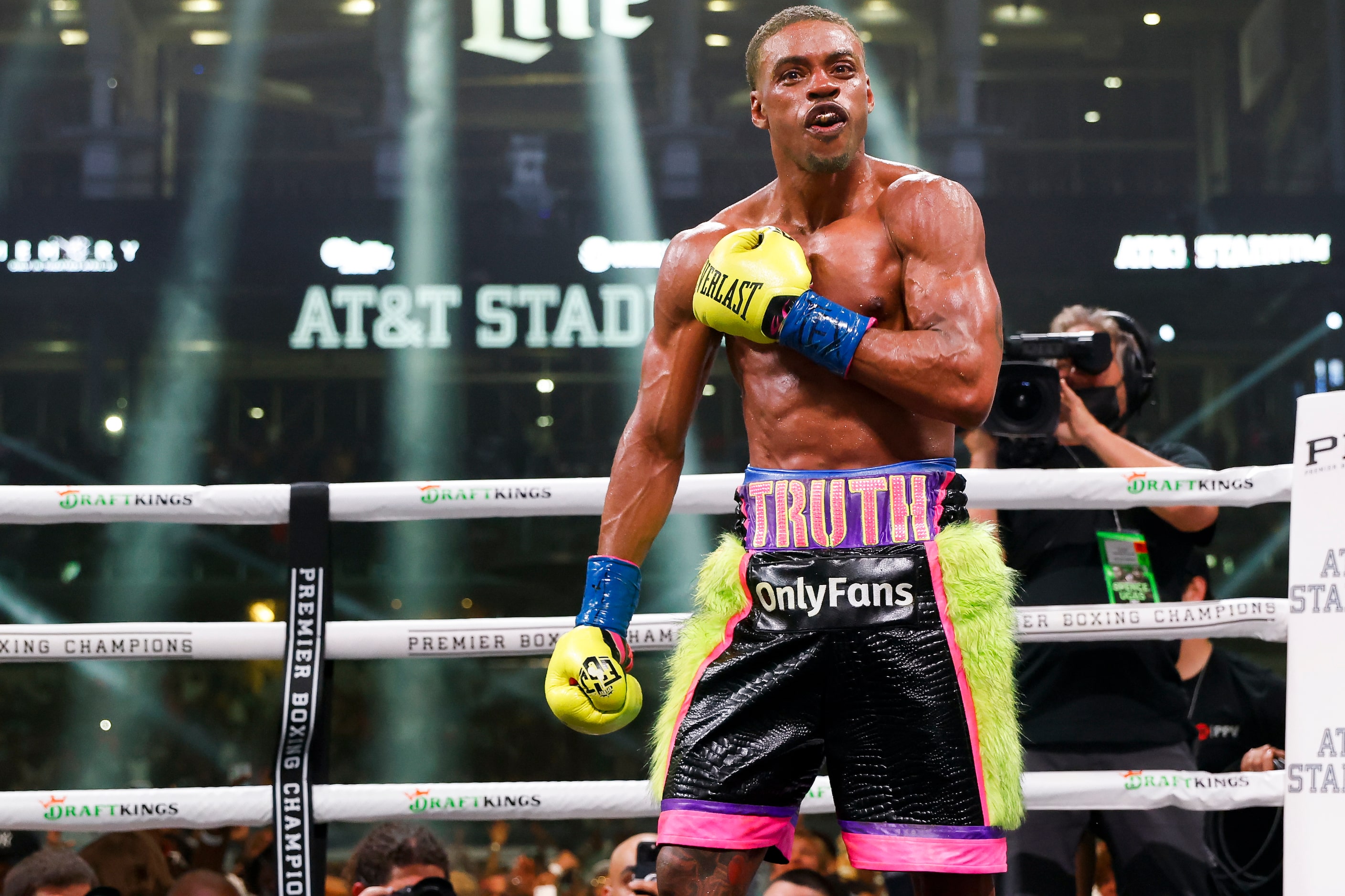 DeSoto’s Errol Spence Jr. (28-0) celebrates beating Yordenis Ugas (27-4), via a technical...